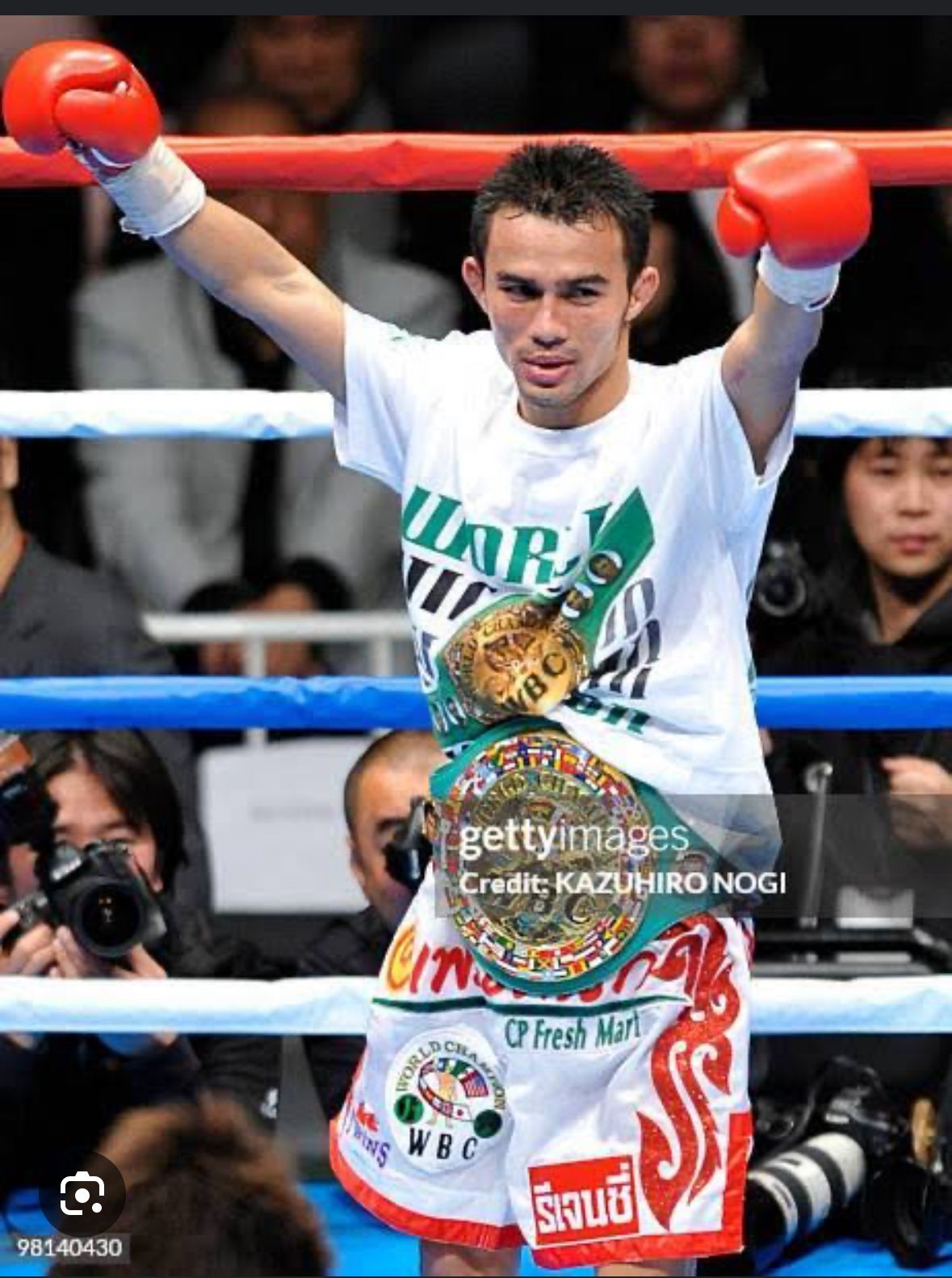 Oleydong victory with WBC belts (watermarked)